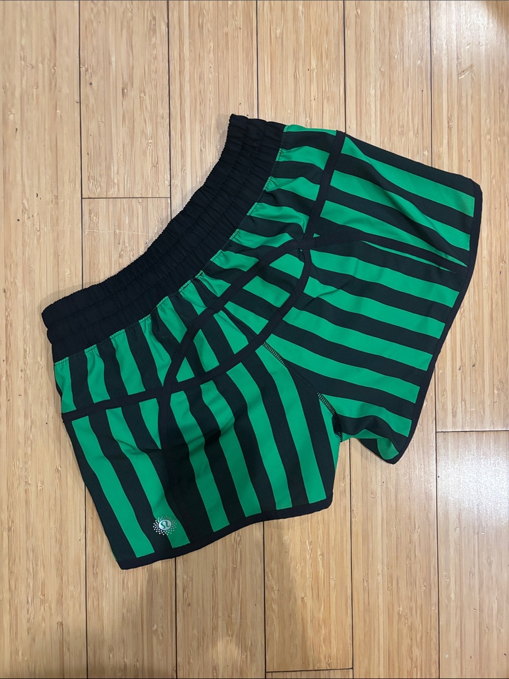 lululemon athletica Seawheeze Tracker Short 4’ Green and Black Striped Run Short - Picture 2 of 6